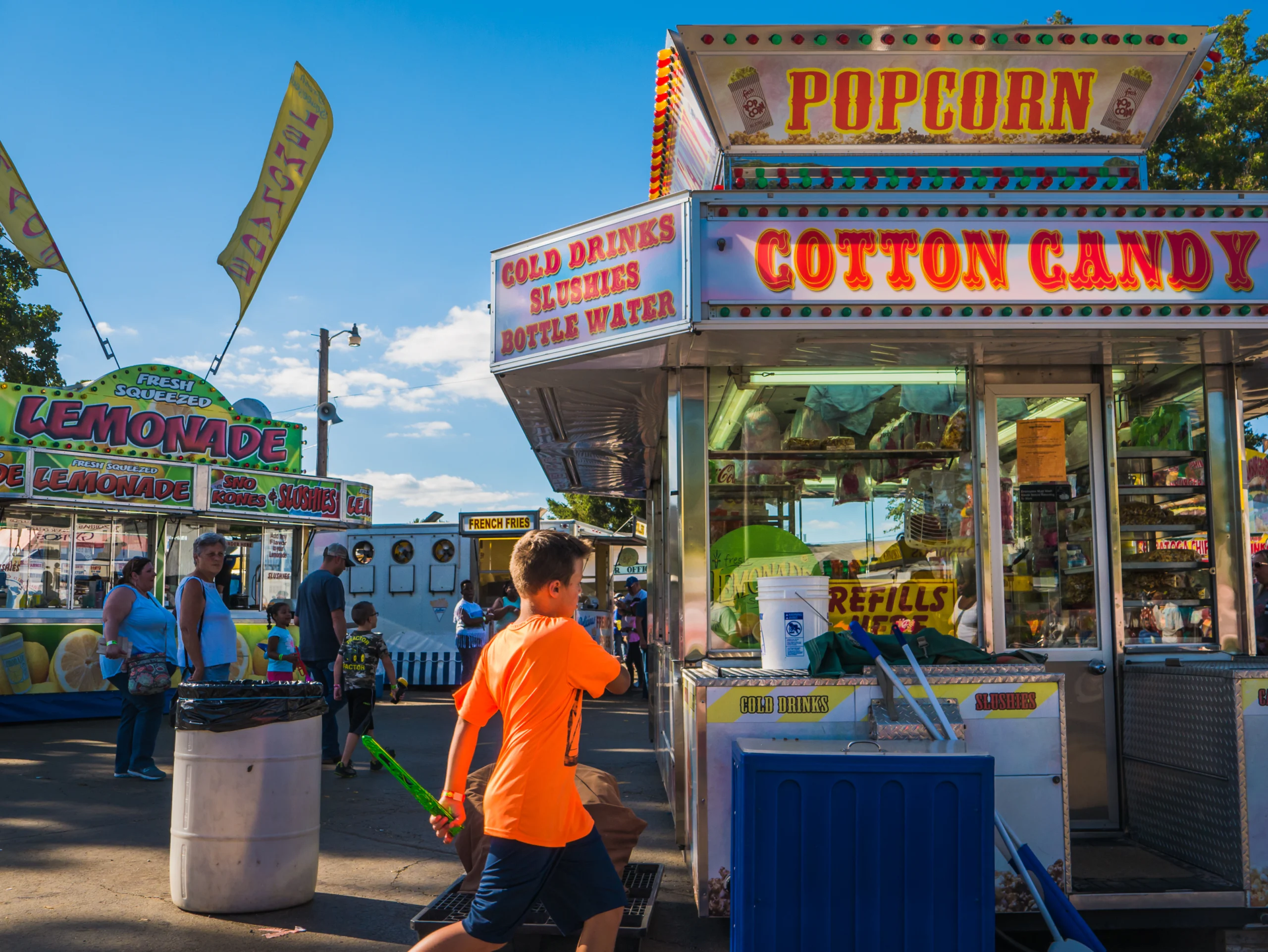 Kids running around state fair food