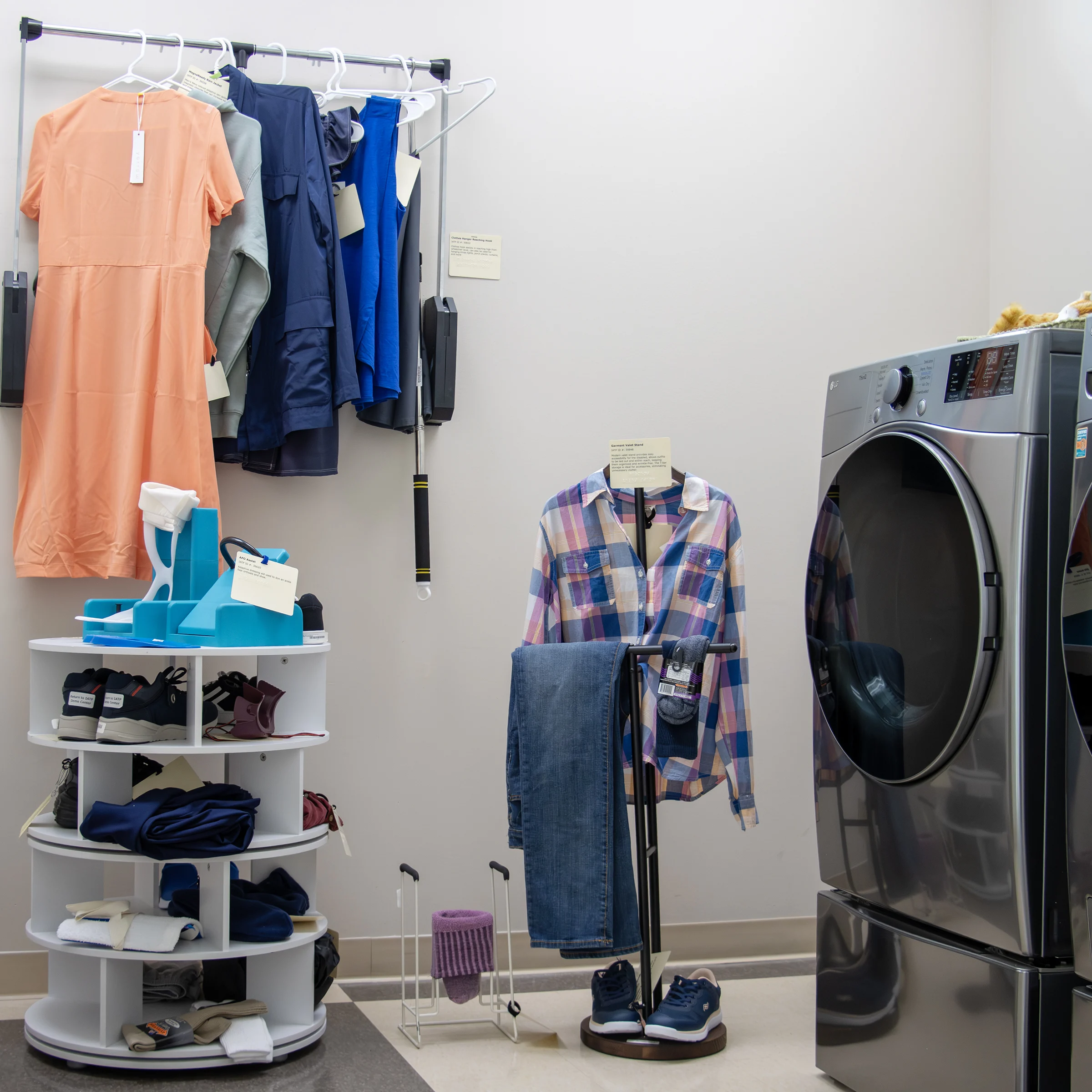 Various clothing items hanging in the laundry room of IATP’s Demonstration Center